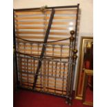 A contemporary grey painted tubular metal and brass framed three-quarter size bedstead, having