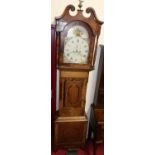 An early 19th century north country oak and mahogany long case clock, the arch painted dial signed