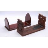 An Anglo-Indian carved hardwood bookslide, w.34cm; together with an Edwardian inlaid mahogany