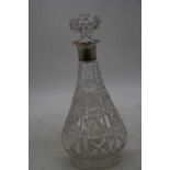 A crystal decanter, having silver collar, h.27.5cm