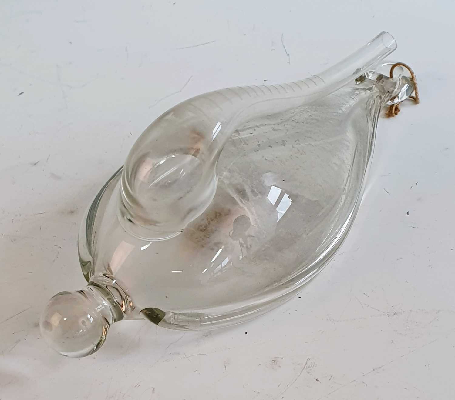 A circa 1800 Dutch donderglas or weather glass, of pear shape with integral suspension loop and