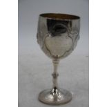 A Victorian repousse decorated silver goblet, London 1871, h.13cm, 3.5oztThe goblet does lean