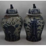 A pair of Chinese blue and white glazed temple jars and covers, h.51cmIn good condition, but quite