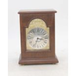 A 1977 Silver Jubilee commemorative mantel clock, the silver dial showing Roman numerals and