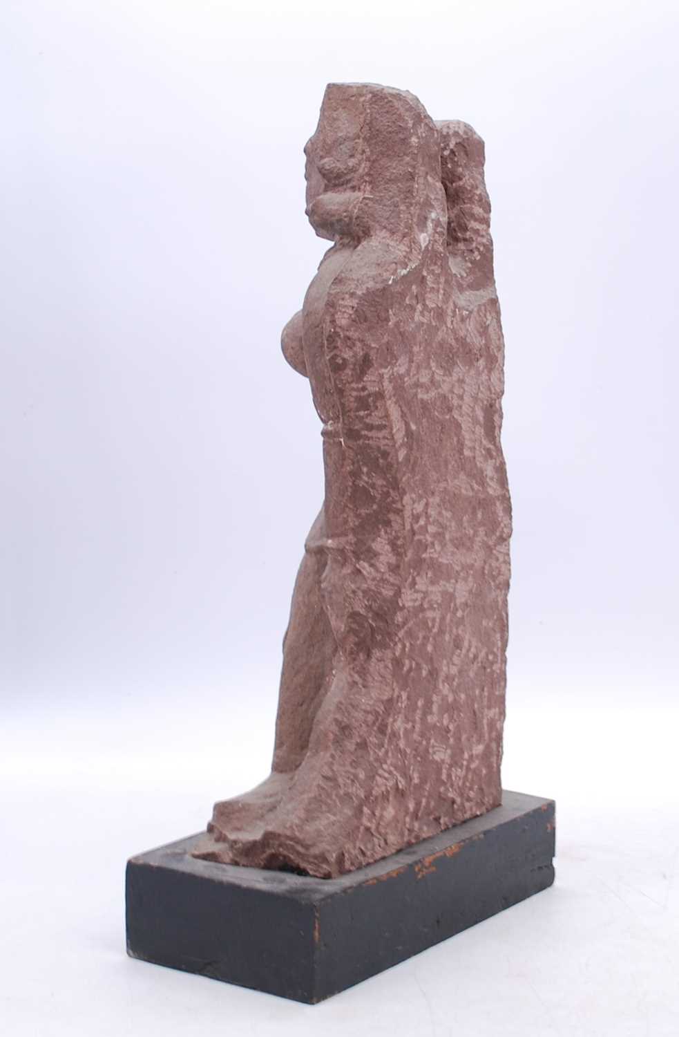 An Eastern carved sandstone figure of a lady, mounted upon an ebonised plinth, h.43cm - Bild 2 aus 2