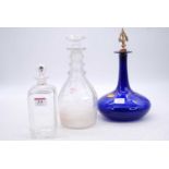 A Regency triple ring neck glass decanter, of mallet form, h.26cm; together with a Bristol blue