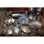 Two boxes of metalware, to include a pair of Mappin & Webb silver plated ewers, a brass vase, and