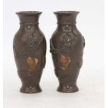 A pair of Japanese Meiji period vases, relief decorated with flowers, h.12cm