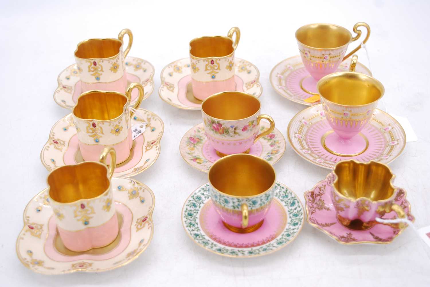 A collection of nine late 19th / early 20th century pink glazed coffee cans, to include Royal