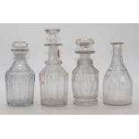 A Regency cut glass decanter, of mallet form, h.21cm; together with three other similar