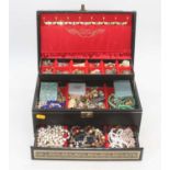 A jewellery box containing costume jewellery, to include beaded necklaces and brooches