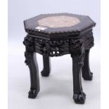 A Chinese marble topped carved hardwood table, of small proportions, h.23cm