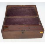 A 19th century mahogany writing slope, the lid lifting to reveal a purple velvet lined interior, w.