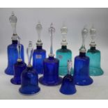 A collection of nine 19th century Nailsea type cobalt blue glass bells, to include an opaque twist