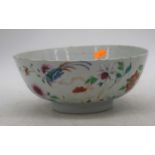 An 18th century Chinese export porcelain bowl, enamel decorated with flowers, dia.23.5cm (a/f)