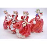 A collection of four Royal Doulton porcelain models of ladies, to include Top of the Hill and Autumn