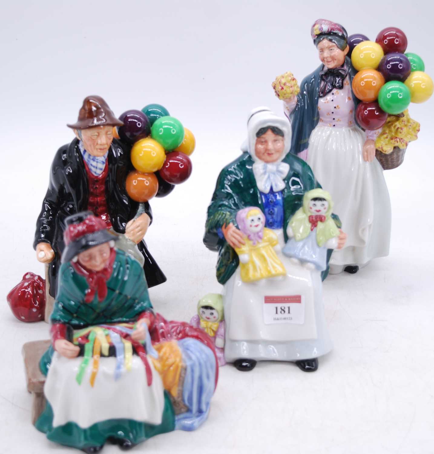 A collection of four Royal Doulton figures, to include The Rag-doll Seller, Silk & Ribbons, Biddy