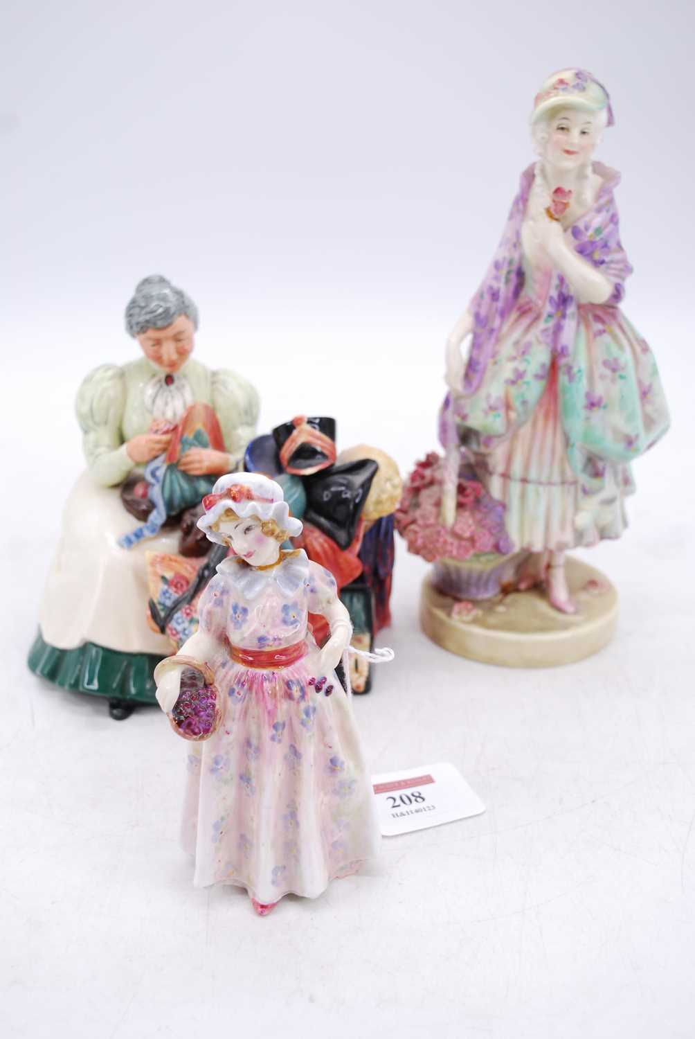 A Royal Doulton figure 'Phyllis', h.23cm; together with two others 'Wardrobe Mistress' and 'Cerise'