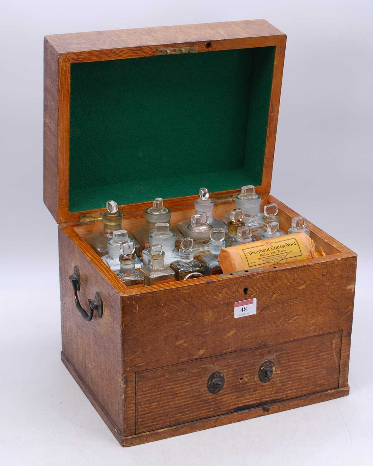 A 19th century scrumble pine apothecary chest, the lid lifting to reveal an arrangement of fitted