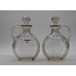 A pair of cut glass claret jugs, h.23cm