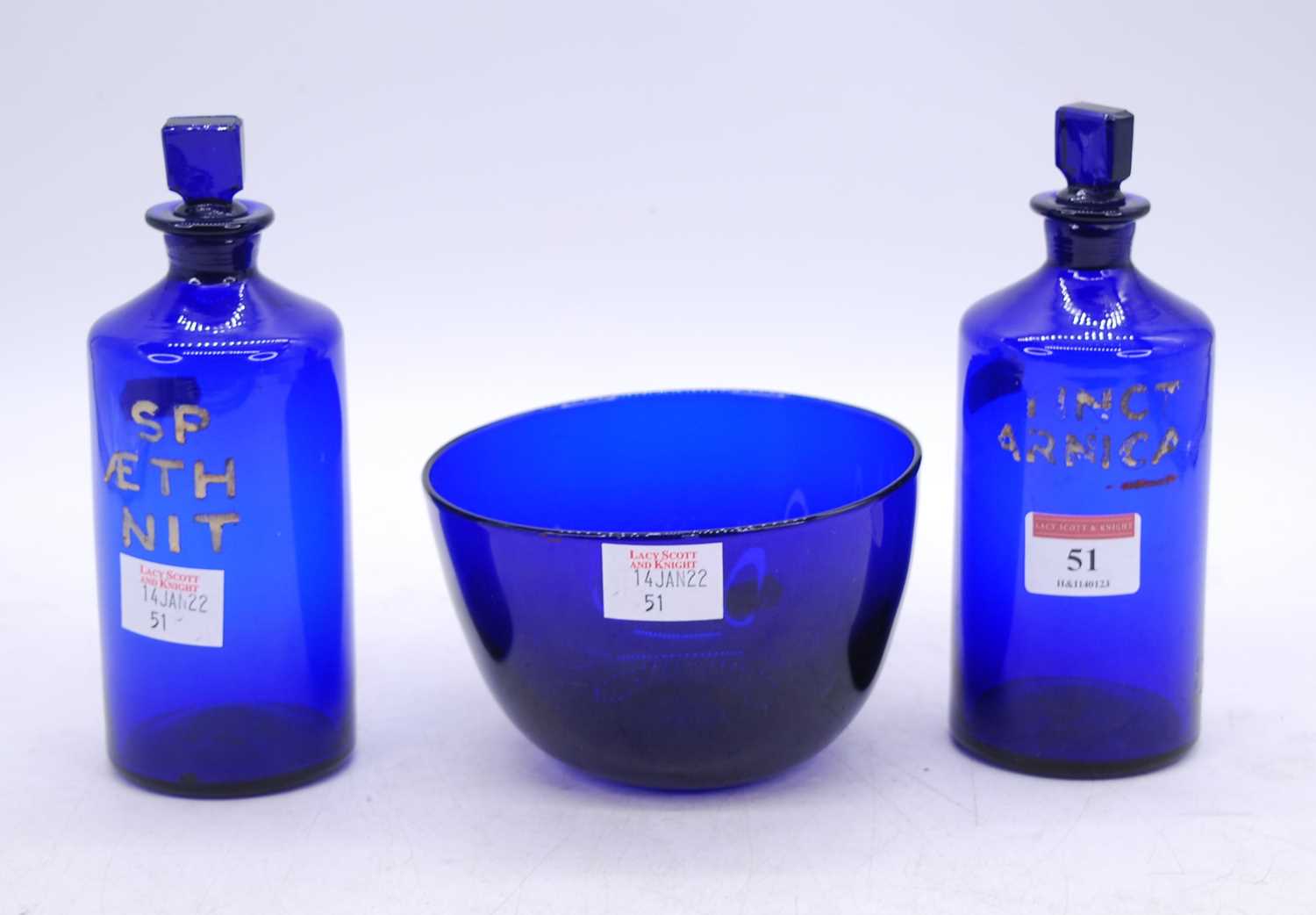 A pair of 19th century Bristol blue glass apothecary jars, each h.18cm; together with a matching