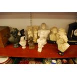 A collection of twelve resin busts of historical figures, the largest h.36cm