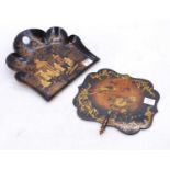 A Victorian black lacquered papier-mache crumb tray, 26cm; together with a Victorian ebonised fan (