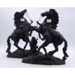 A pair of spelter models of the Marly Horses, h.39cm