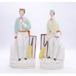 A pair of 19th century Staffordshire flatback figures of cricketers, h.35cmBoth in poor condition.