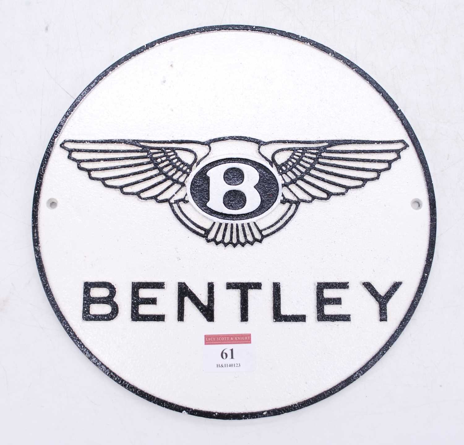 A reproduction cast iron Bentley advertising wall sign, dia.25cm
