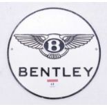 A reproduction cast iron Bentley advertising wall sign, dia.25cm