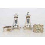 A pair of George V silver salt and pepper shakers, Birmingham 1919, 0.9ozt; together with two napkin