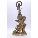 A 19th century brass doorstop, in the form of a putto amongst vines, h.49cmThe handle is very