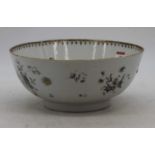 An 18th century Chinese porcelain bowl, decorated with flowers and having a spear head border (