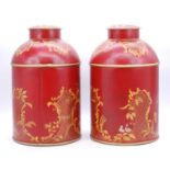 A pair of reproduction red toleware type tea canisters, h.36cm