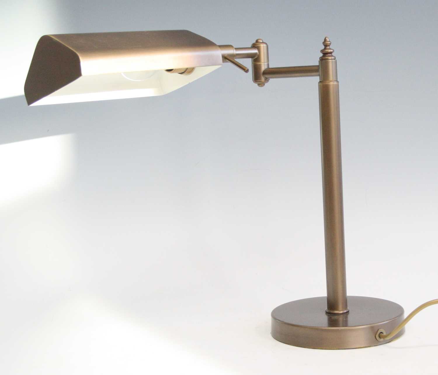 A contemporary brushed brass banker's desk lamp, having adjustable shade and branch arm, raised on - Image 2 of 2