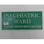 A reproduction cast iron Psychiatric Ward sign