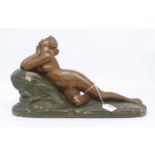 An Art Deco style plaster figure of a reclining nude, height 26cm