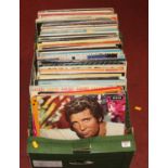 A collection of vintage LPs to include The Bachelors, Tom Jones, and Images