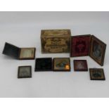 A collection of Victorian photographic miniatures; together with a money-box
