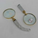 Two magnifying glasses with facet cut glass handles