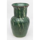 A 20th century green drip glazed studio pottery vase, of baluster form, height 37cm