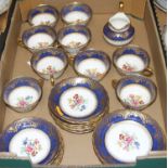 A Mortlocks Limited floral and gilt decorated part tea set