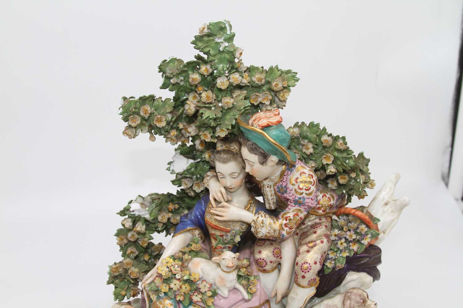 A pair of 19th century hard paste porcelain bocage figure groups, after Chelsea, each depicting a - Image 9 of 10