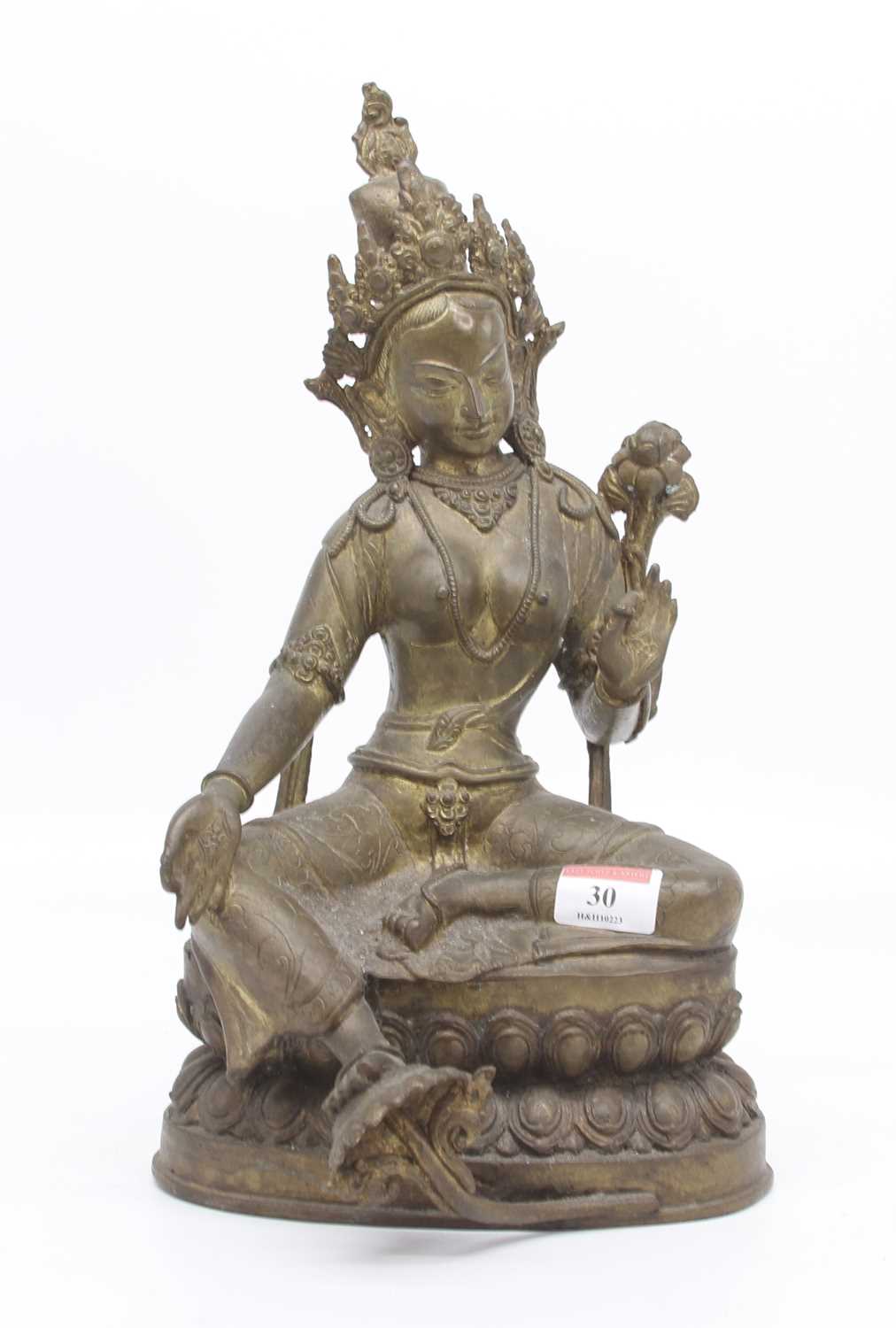 A brass figure of the Tibetan deity Tara, height 35cm