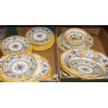 An Italian polychrome decorated part dinner service Two oval dishes.Seven oval plates.Two large