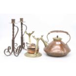 An Arts & Crafts brass and copper spirit kettle, in the manner of Dr Christopher Dresser (a/f),