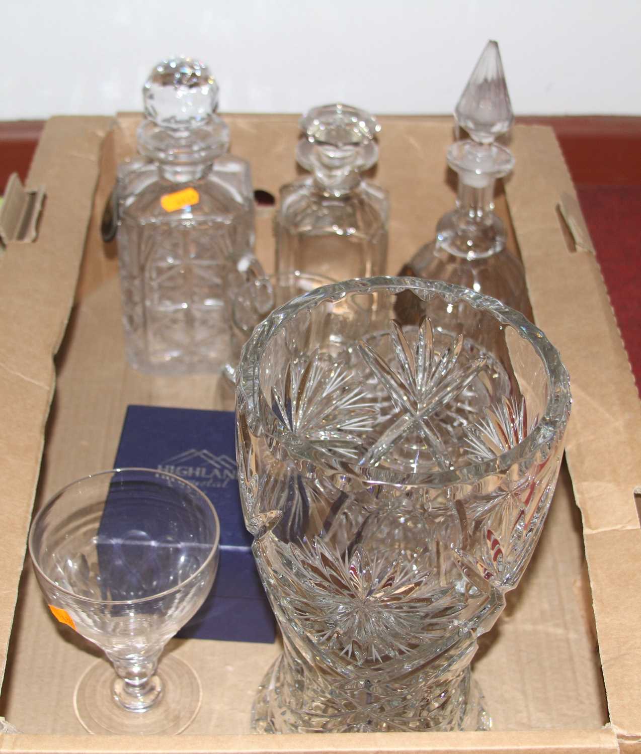 A collection of crystal, to include decanters, and a vase
