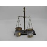 A set of brass balance scales, h.25cm; together with weights