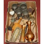 A collection of metal ware to include pewter tankards and copper vases